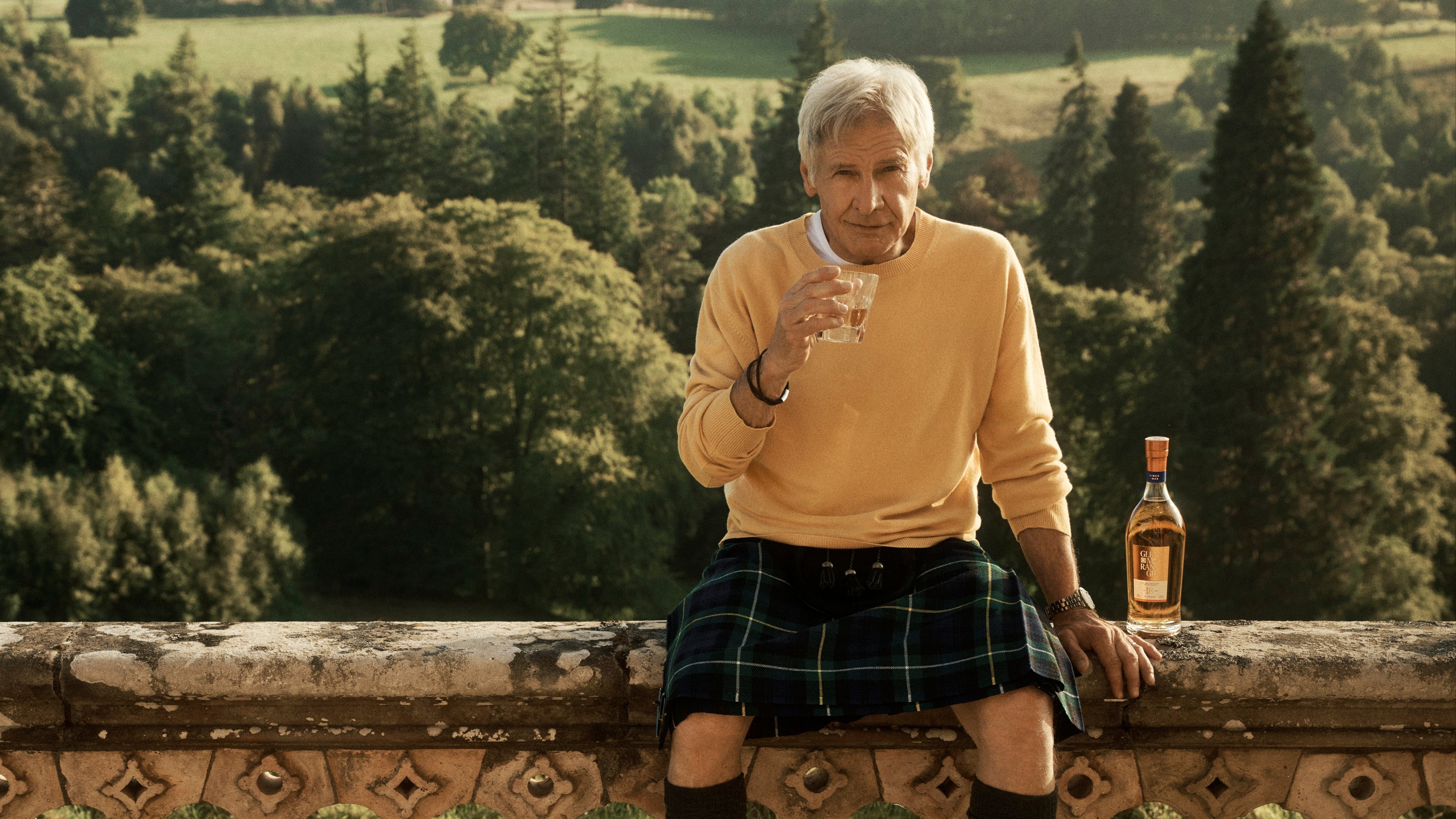 Harrison Ford drinking Glenmorangie single malt whisky.